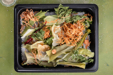 Tray of cut carrots celery and parsley