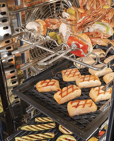 Roasted fish and vegetables inside magistar combi oven